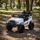 Macchina Elettrica per Bambini Fuoristrada Toyota Fj Cruiser 12V Telecomando Ruote in Gomma e Sedile in Pelle Bianco