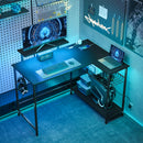 Scrivania da Gaming Angolare con LED Prese Elettriche Supporto per Monitor e Scaffale Nero      