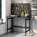 Banco da Lavoro Pieghevole Portatile 115x62x143,5 cm con Pannello Perforato Piano Spesso in Legno Struttura in Acciaio Nero      